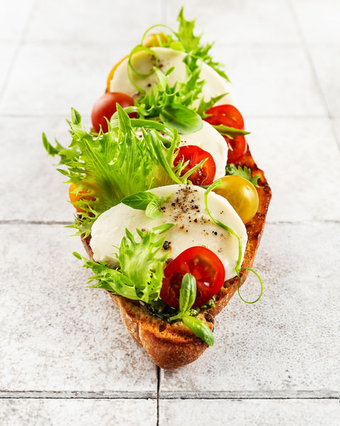 Photograph Mihails Pavlenko Tasty Bruschetta With Tomatoes on One Eyeland