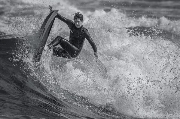 Photograph Steve Turner Local Surfer on One Eyeland