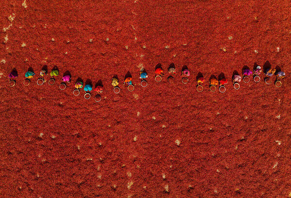 Photograph Azim Khan Ronnie Drying Red Chilies 03 on One Eyeland