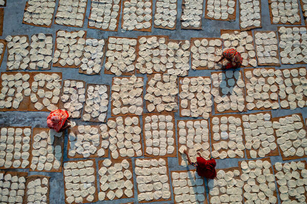 Photograph Azim Khan Ronnie Drying Noodles 03 on One Eyeland