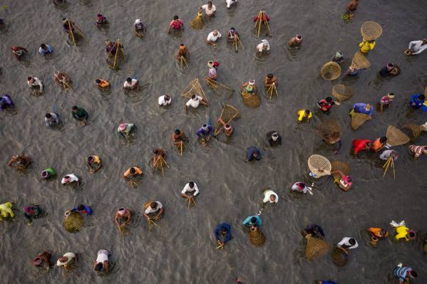 Photograph Azim Khan Ronnie Traditional Fishing Festival 03 on One Eyeland