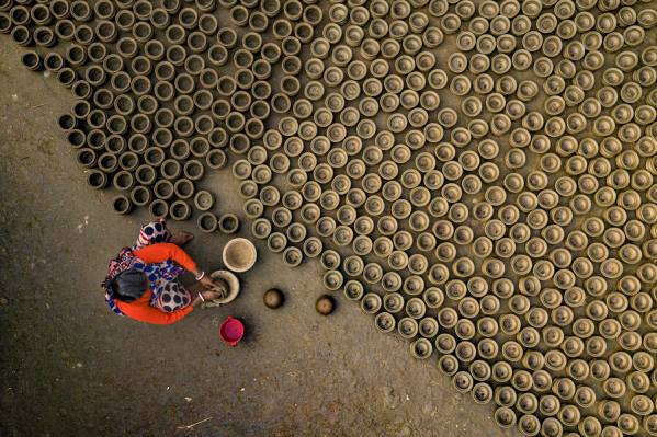 Photograph Azim Khan Ronnie Pot Maker 04 on One Eyeland