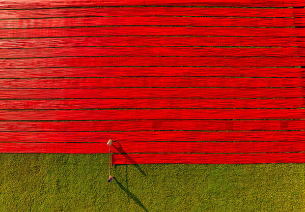Photograph Azim Khan Ronnie Red Field on One Eyeland