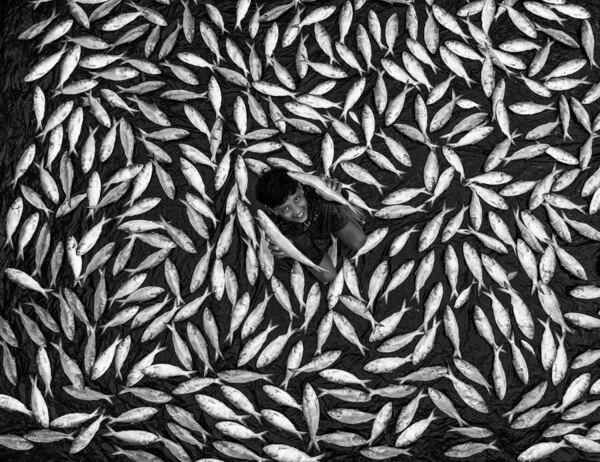 Photograph Azim Khan Ronnie Fish Boy on One Eyeland