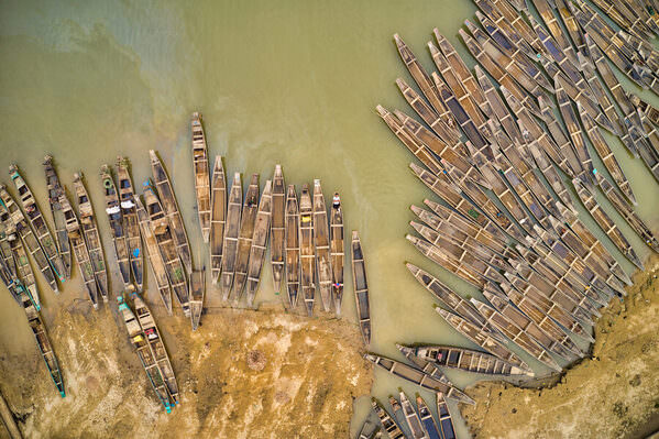 Photograph Azim Khan Ronnie Massive Boats on One Eyeland
