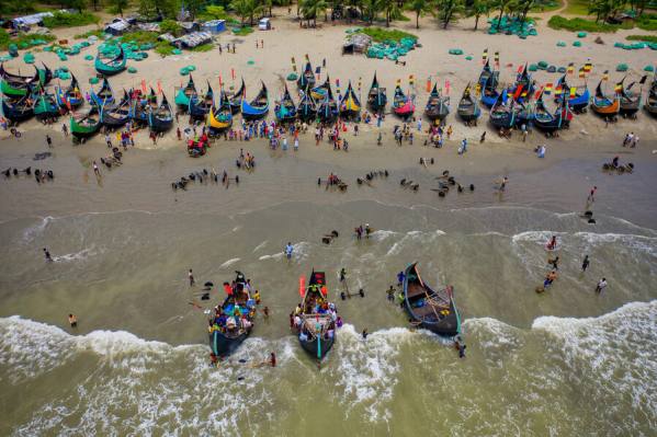 Photograph Azim Khan Ronnie Fishing Boats On The Shore on One Eyeland