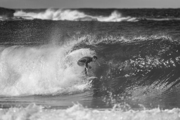 Photograph Steve Turner Reef Surfing on One Eyeland