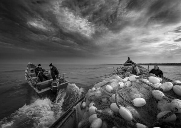 Photograph Hosein Riahi Fishermen Go To The Storm on One Eyeland