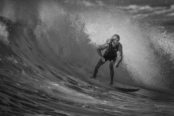 Photograph Steve Turner Surfer on One Eyeland
