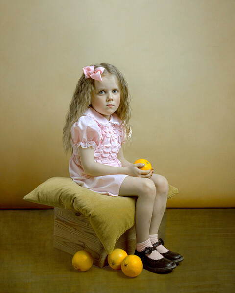 Photograph Diana Burdein Girl With Oranges on One Eyeland