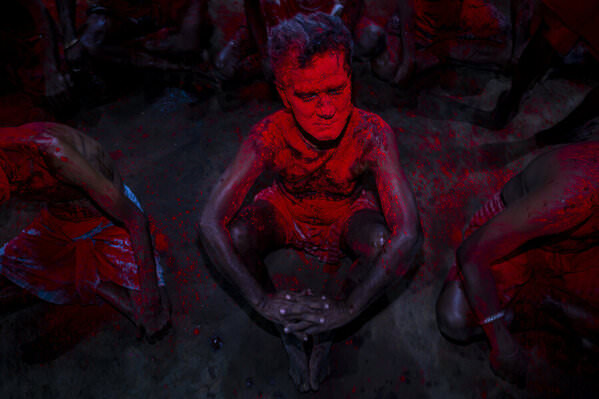 Photograph Aniket Pal Man In Red on One Eyeland