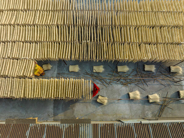 Photograph Azim Khan Ronnie Women Drying Vermicelli on One Eyeland