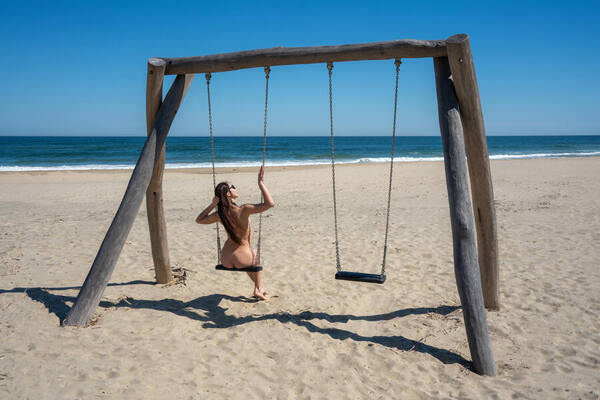 Photograph Taymuraz Gumerov Swings on One Eyeland