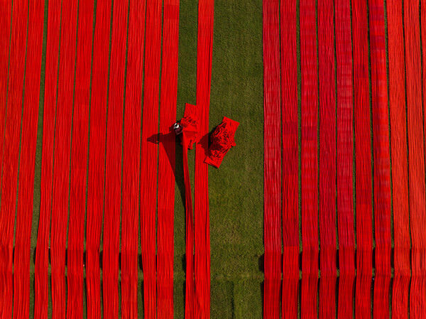 Photograph Azim Khan Ronnie Drying Cloths on One Eyeland