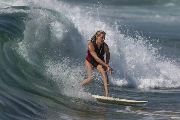 Photograph Steve Turner Surfer Girl on One Eyeland