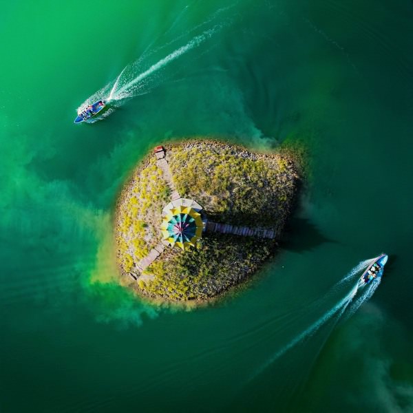 Photograph Faheem Hassani Crossing Boats on One Eyeland