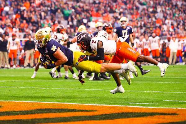 Photograph Arianna Grainey Fiesta Bowl Superman Catch on One Eyeland