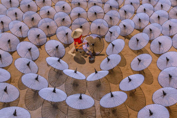 Photograph Kyaw Zay Yar Lin Making Umbrellas on One Eyeland