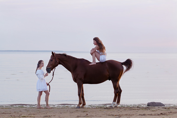 Photograph Natalia Matyukhina A Girl With A Horse on One Eyeland