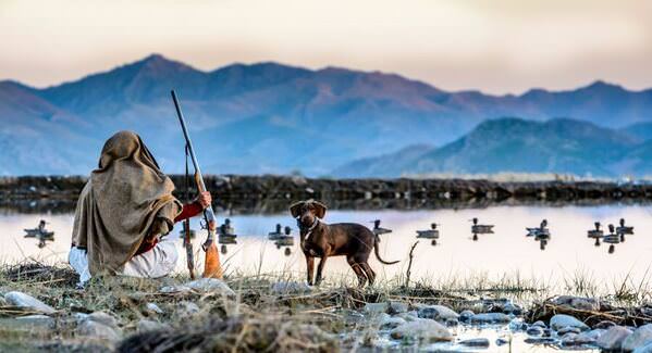 Photograph Irfan Ali Hunter With Pointer on One Eyeland