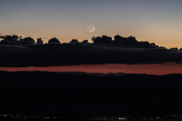 Photograph Mel Yukiina Crescent Moon on One Eyeland
