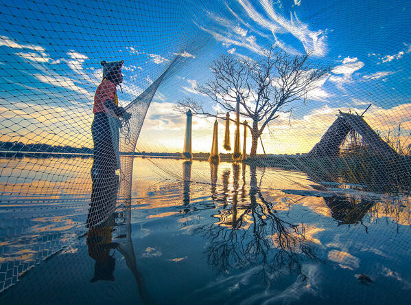 Photograph Aung Chan Thar Fishing Morning on One Eyeland
