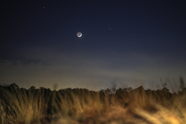 Photograph Mel Yukiina Crescent Moon on One Eyeland