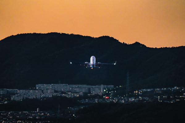 Photograph Mel Yukiina Takeoff Into Twilight on One Eyeland