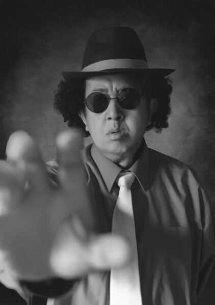Photograph Kaz Urata Dapper Detective on One Eyeland
