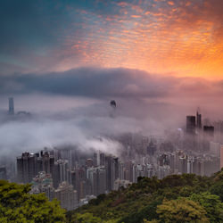 Sunrise glow decorates the city in fog-Carlo Yuen-finalist-ARCHITECTURE-Cityscapes -4941