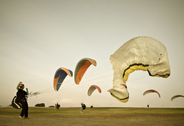 Photograph Chad Holder Paragliders on One Eyeland