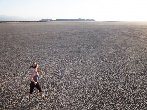 Photograph Sam Diephuis Running In The Desert on One Eyeland