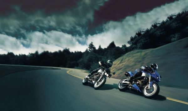 Photograph Don Johnston Two Bikes Cornering on One Eyeland