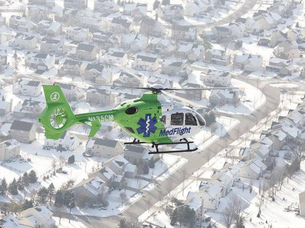 Photograph Larry Hamill Medflight Over Suburbs on One Eyeland
