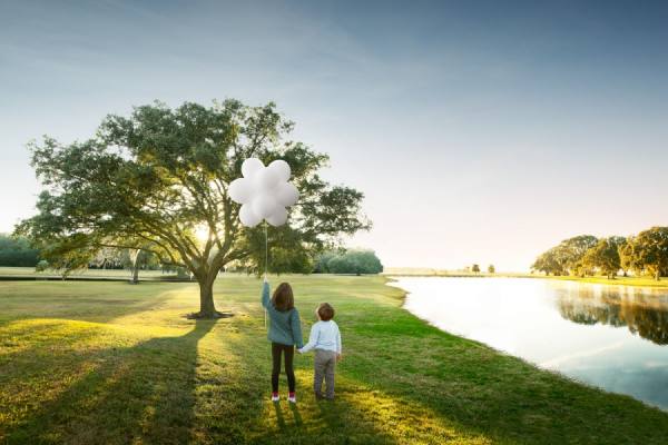 Photograph Matt Sartain Children And Balloons on One Eyeland