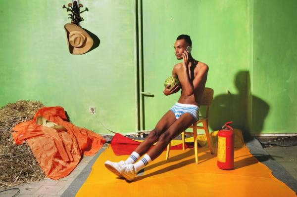 Photograph Kiril Stanoev Man With Phone on One Eyeland