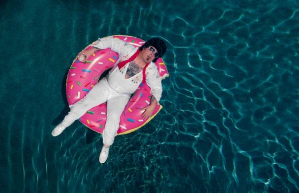 Photograph Kremer Johnson Elvis Impersonator Hits The Pool on One Eyeland