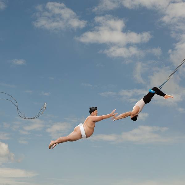 Photograph John Lund Sumo Flyiing Trapeze on One Eyeland