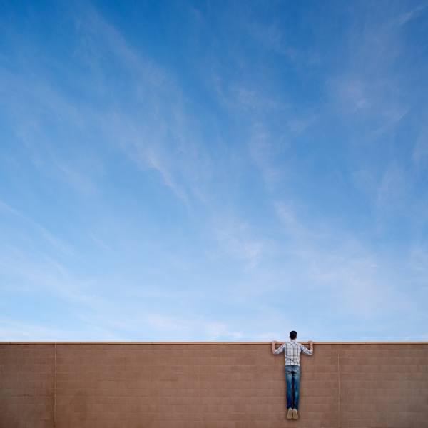 Photograph Jens Lucking Wall Spy on One Eyeland