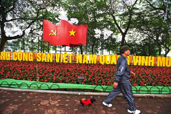 Photograph Viet Van Tran Walking Around Hoan Kiem Lake on One Eyeland