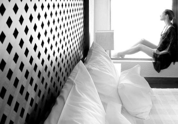 Photograph Dimitris Poupalos Girl On The Window on One Eyeland