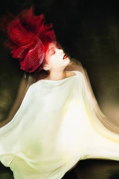 Photograph Yifei Gu Red Hat on One Eyeland
