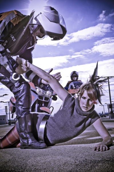 Photograph Mike Kremer Police Vs Model on One Eyeland