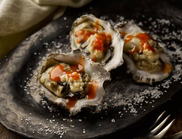 Photograph Greg Stroube Oysters And Hot Sauce on One Eyeland