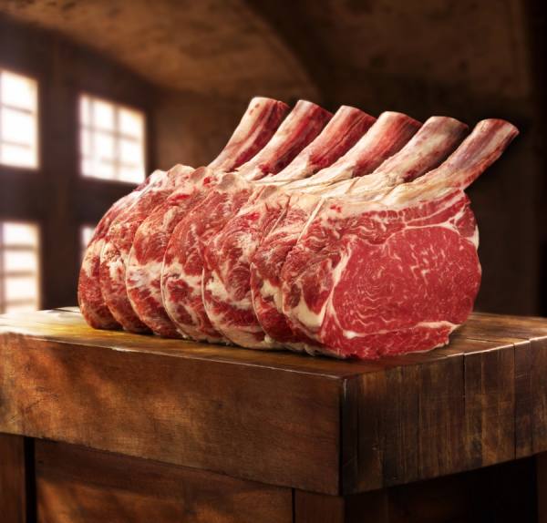 Photograph David Bishop Sanding Rib Eye Roast on One Eyeland
