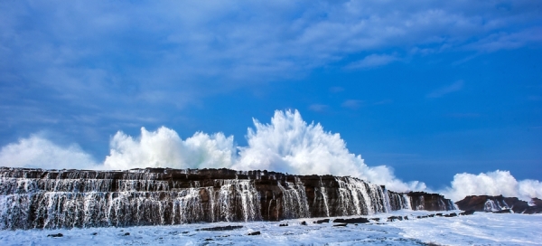 Photograph Welly Agus Big Wave In Indonesia Beach on One Eyeland
