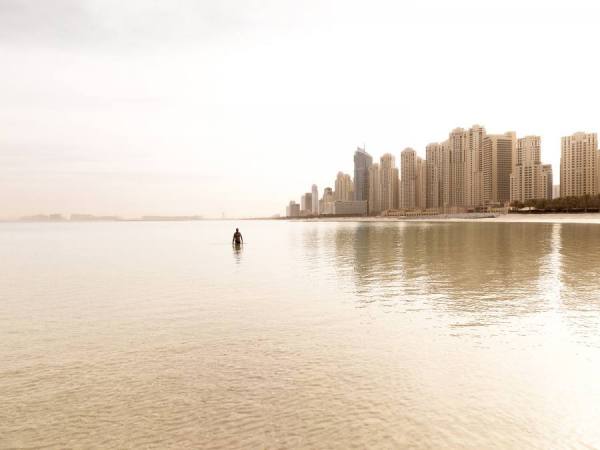 Photograph Carl Lyttle Dubai Swimmer on One Eyeland