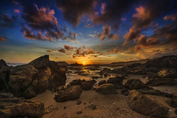 Photograph Welly Agus Scary Sunset At South Sea Indonesia on One Eyeland