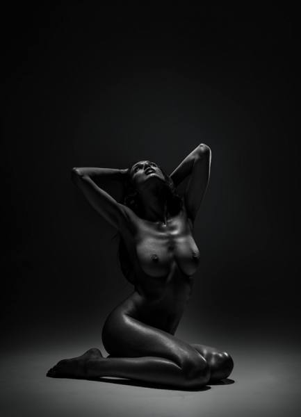 Photograph Piotr Stryjewski Woman In Dark on One Eyeland