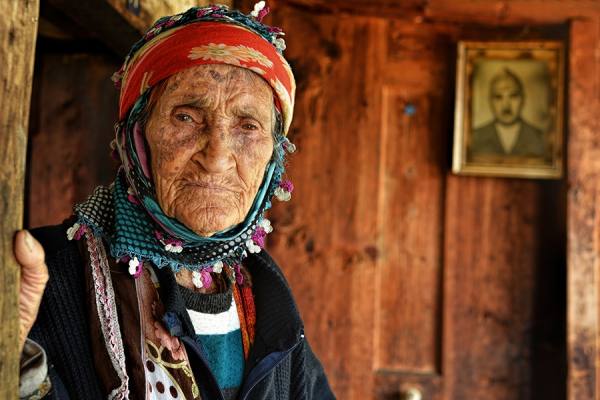 Photograph Soner Bakir Elderly Woman Portrait on One Eyeland